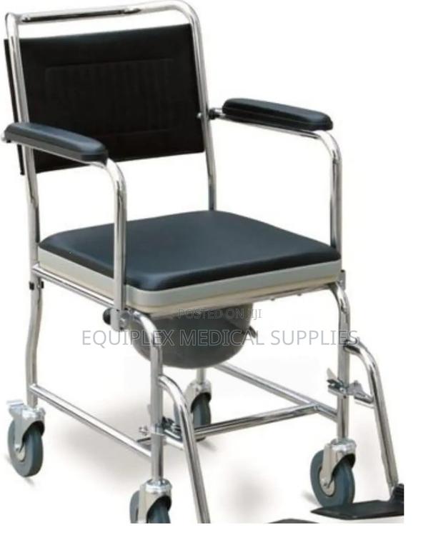 Commode Seat (Has Wheels, Backrest, and Armrest)