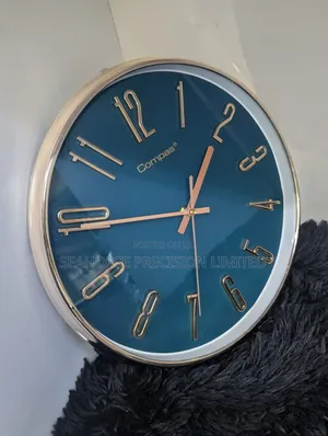 Elegant Compass Wall Clock – Modern Decorative Design