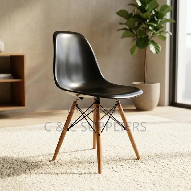 Plastic Armless Eames Dining Seat.