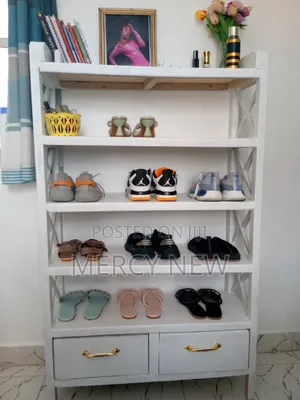 Shoe Rack ,White in Colour,has Two Drawers That You Can Store Socks