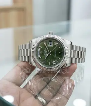 Green Sunburst Dial on This Rolex Day-Date Automatic