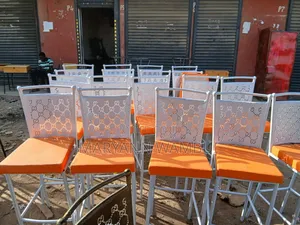 High Powered Coated Chairs With Orange Seats