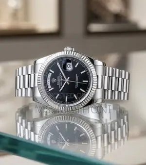 Silver Rolex Day-Date Watch With a Black Dial, Ft Iconic Fluted Bezel