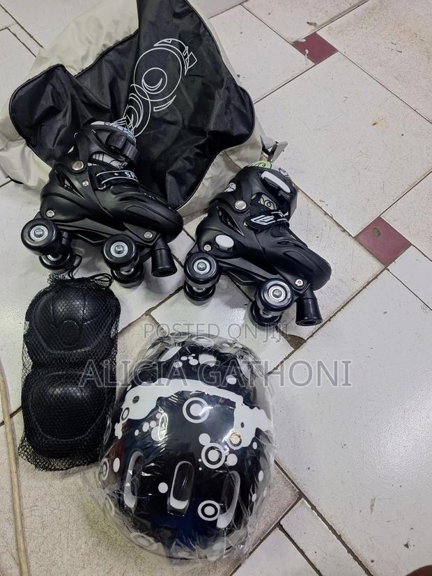 Quad Skates With Protective Gear - main view