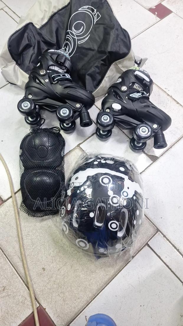Quad Skates With Protective Gear - thumbnail 2