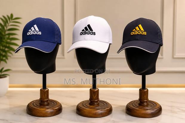 Classic Adidas Trucker Caps Featuring Breathable Mesh Back Panel