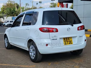 Mazda Demio 2006 Pearl