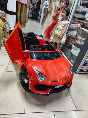 Kids Mini Ride on Toy Car With Bluetooth Speaker.