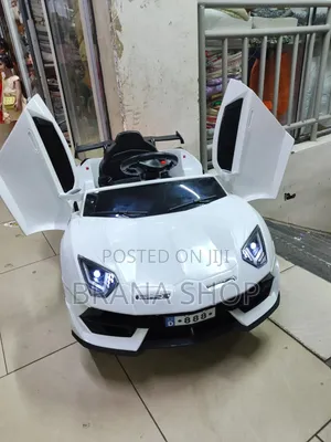 Kids Mini Ride on Toy Car With Bluetooth Speaker.