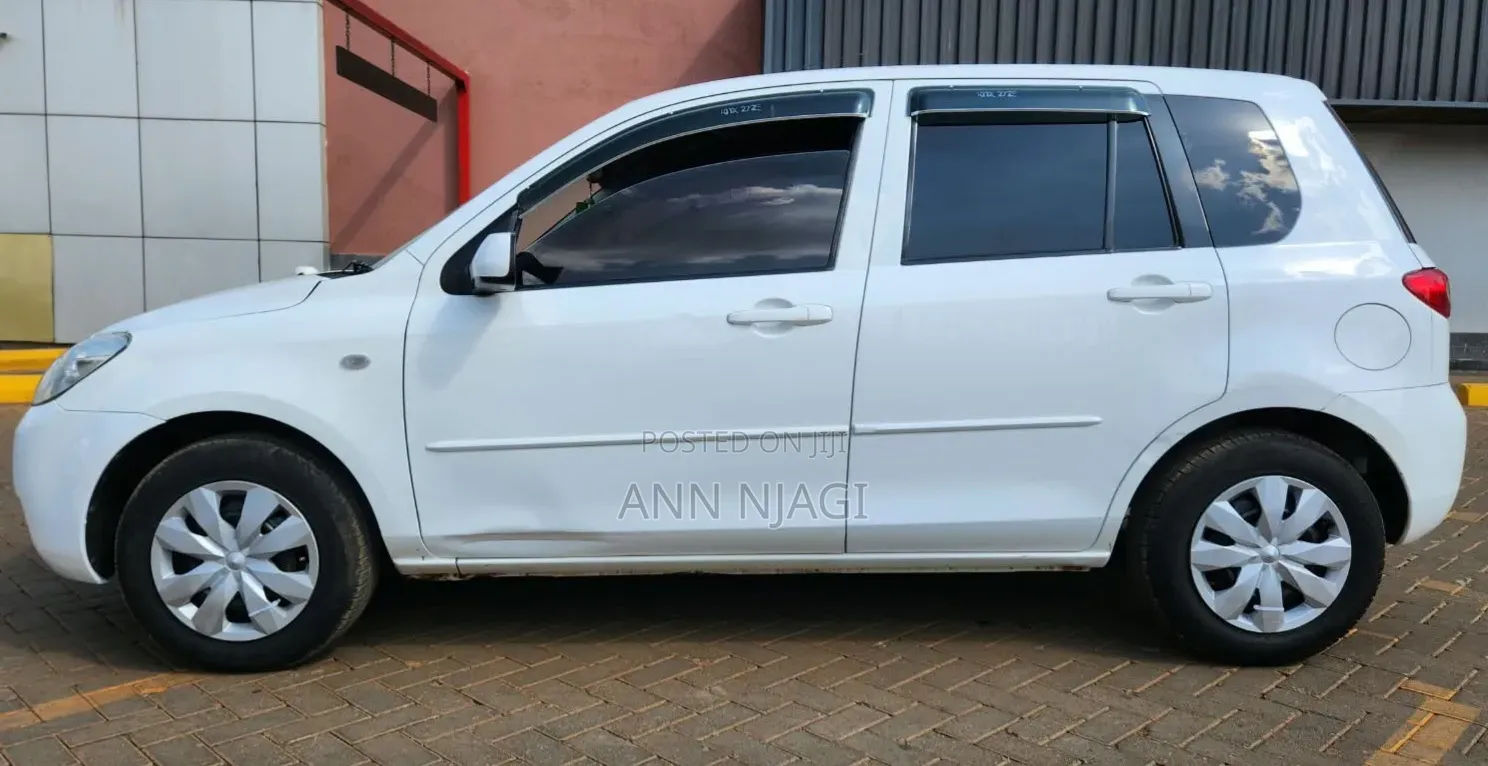 Mazda Demio 2006 Pearl