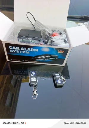 Car Alarm System With Metal Trimmed Keychain With Lock/Unlock Buttons