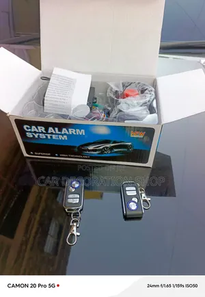 Car Alarm System With Metal Trimmed Keychain With Lock/Unlock Buttons