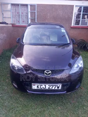 Mazda Demio 2009 Brown