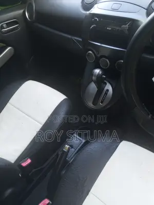 Mazda Demio 2009 Brown