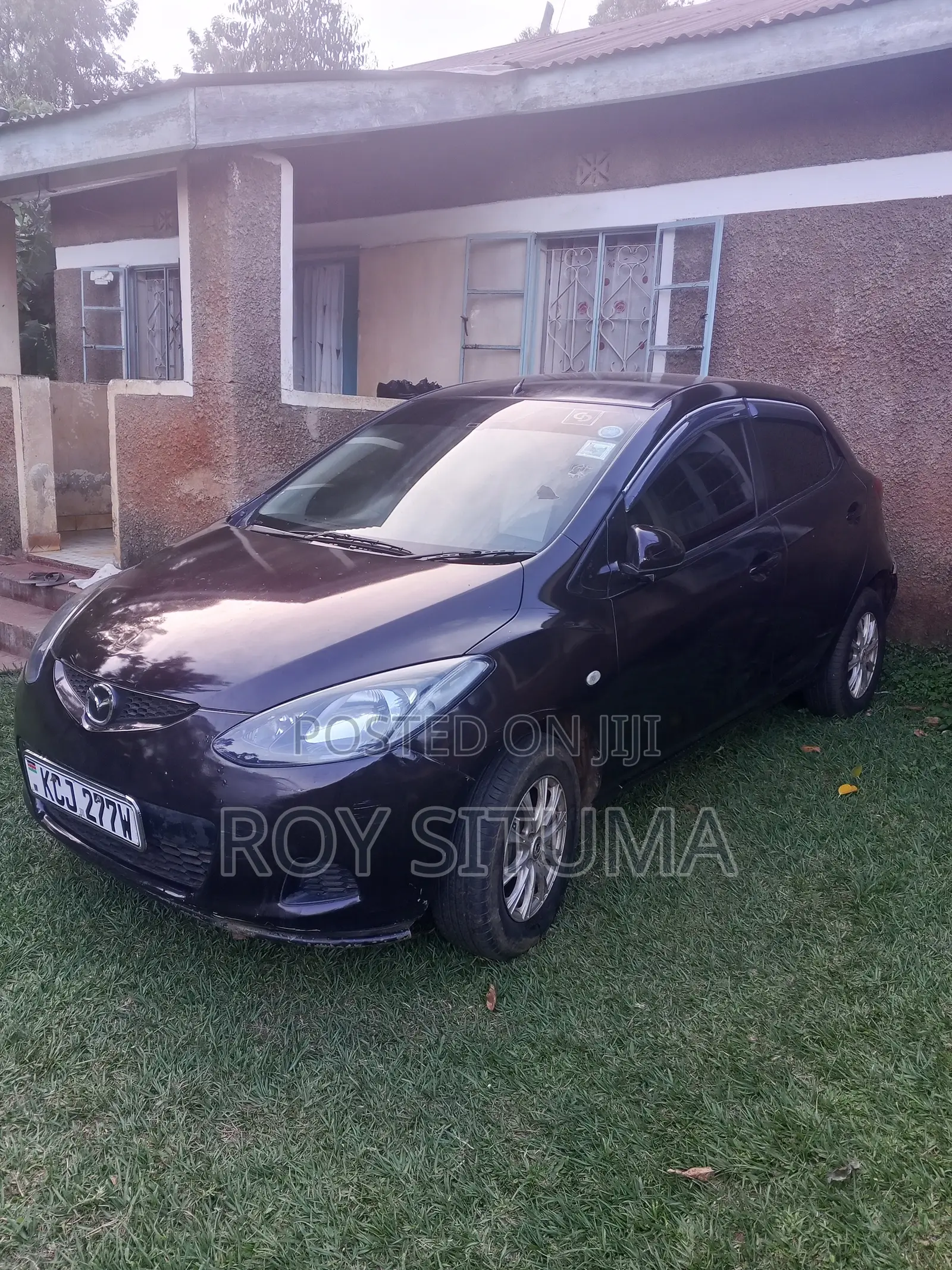 Mazda Demio 2009 Brown