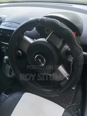 Mazda Demio 2009 Brown