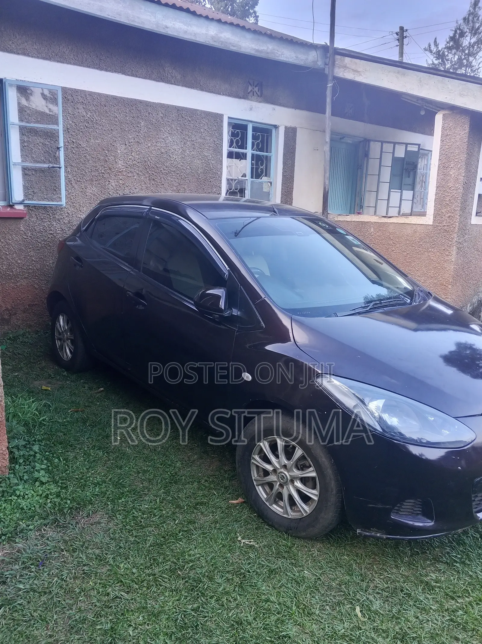 Mazda Demio 2009 Brown