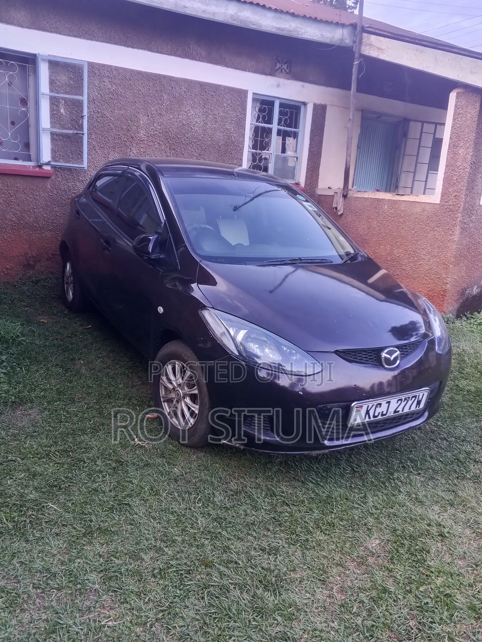 Mazda Demio 2009 Brown