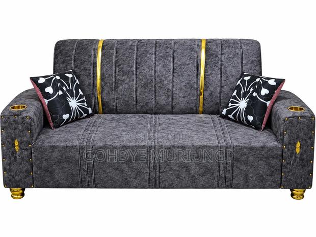 Channel-Tufted Velvet Glam Sofa With Cup Holders and Gold Accents. - main view