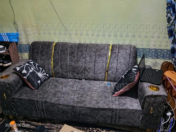 Channel-Tufted Velvet Glam Sofa With Cup Holders and Gold Accents. - thumbnail 2