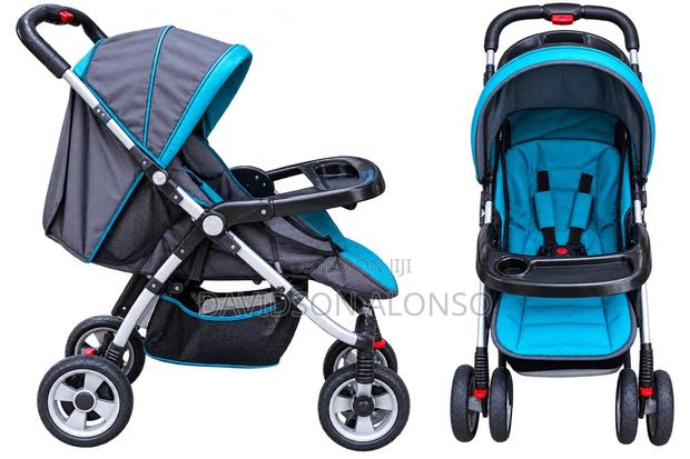 6-Wheel Baby Stroller – Good Condition