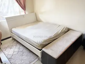 Second -Hand 5by6 Wooden Bed Olus Ottoman Plus Matteress