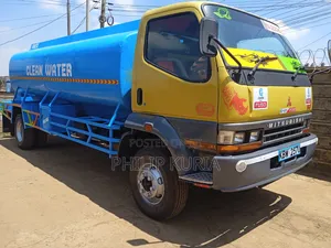 Mitsubishi Fh Water Boozer 2013 Yellow
