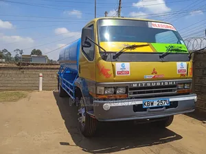Mitsubishi Fh Water Boozer 2013 Yellow