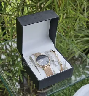 Ladies Watch X Bracelet Set Plus a Complemetary Card Gift Bag