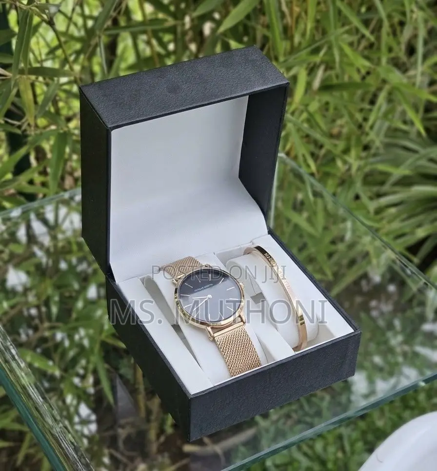  Ladies Watch X Bracelet Set Plus a Complemetary Card Gift Bag