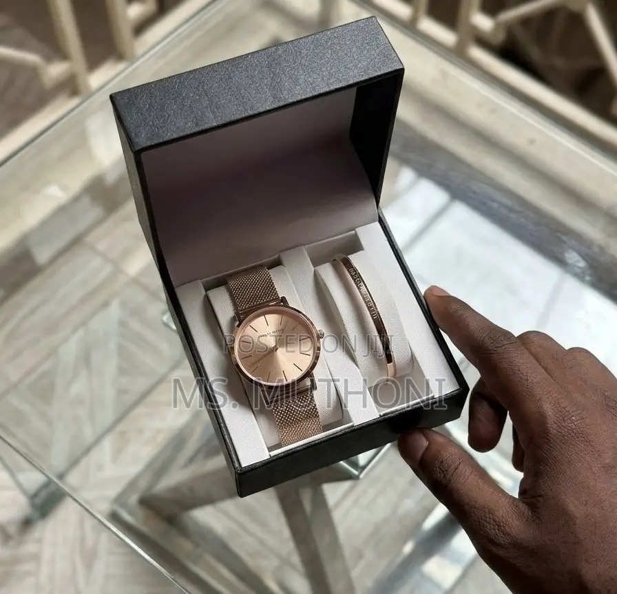  Ladies Watch X Bracelet Set Plus a Complemetary Card Gift Bag