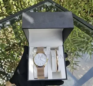  Ladies Watch X Bracelet Set Plus a Complemetary Card Gift Bag