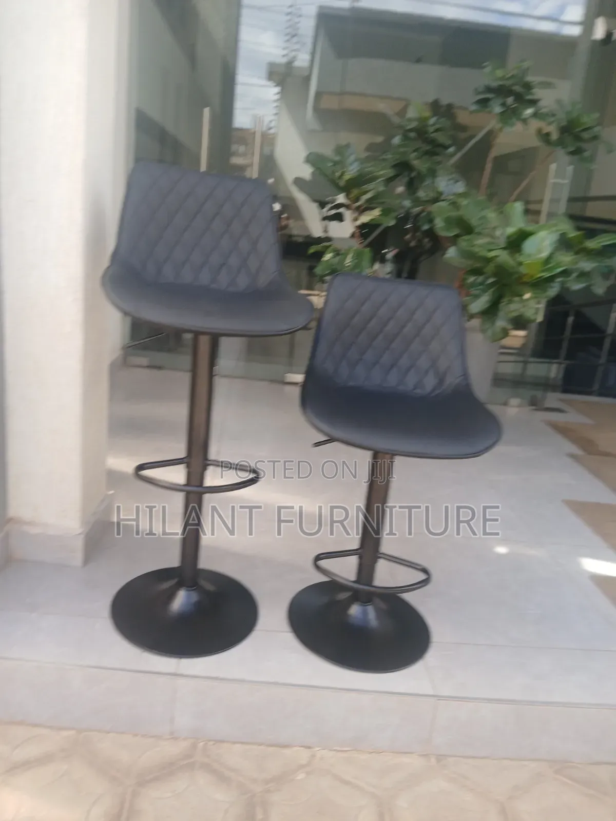 Black Adjustable Bar Stool.