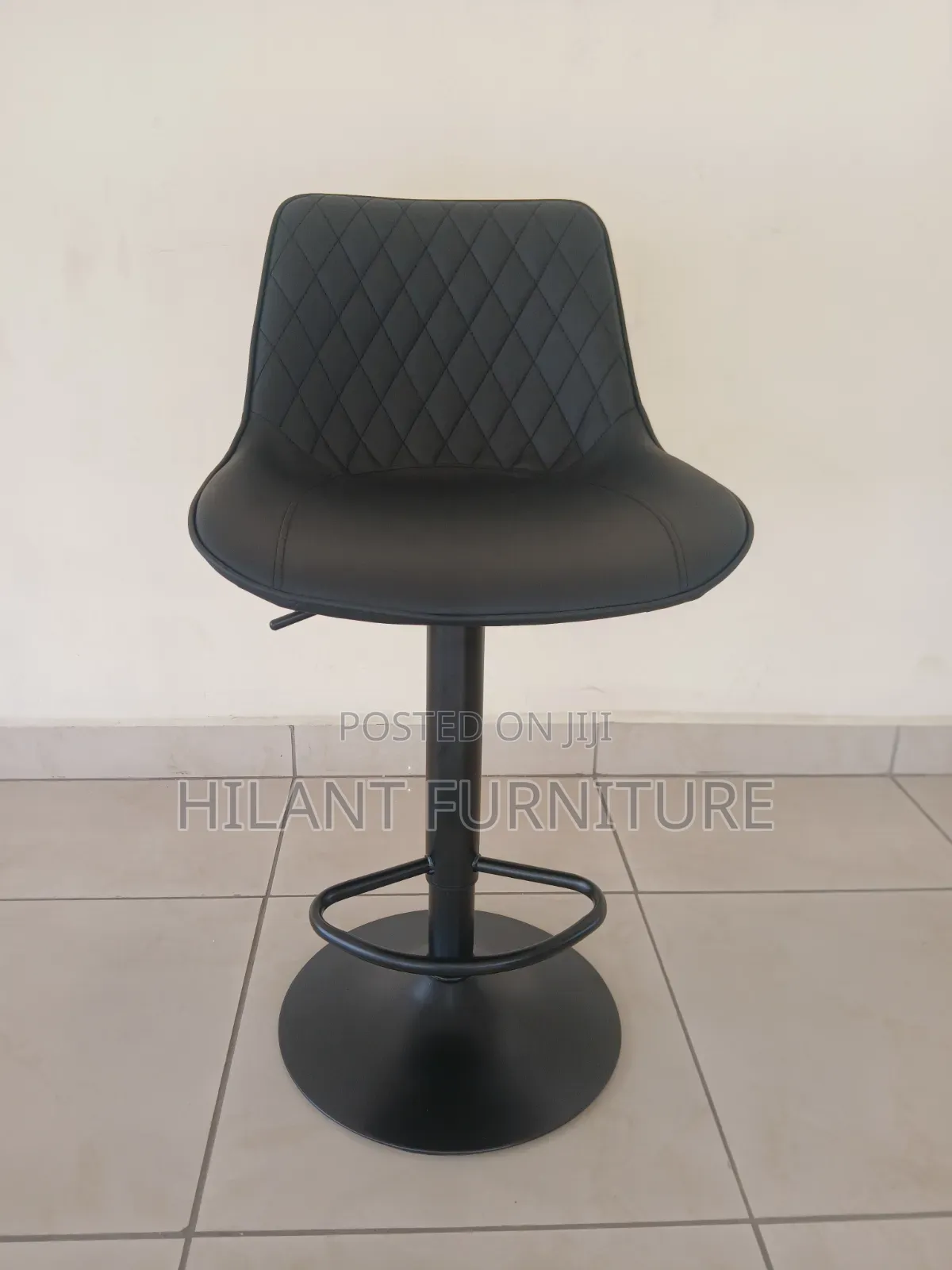 Black Adjustable Bar Stool.