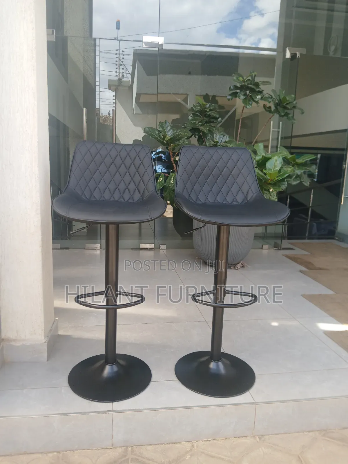 Black Adjustable Bar Stool.