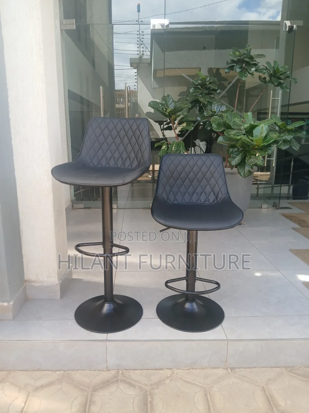 Black Adjustable Bar Stool.