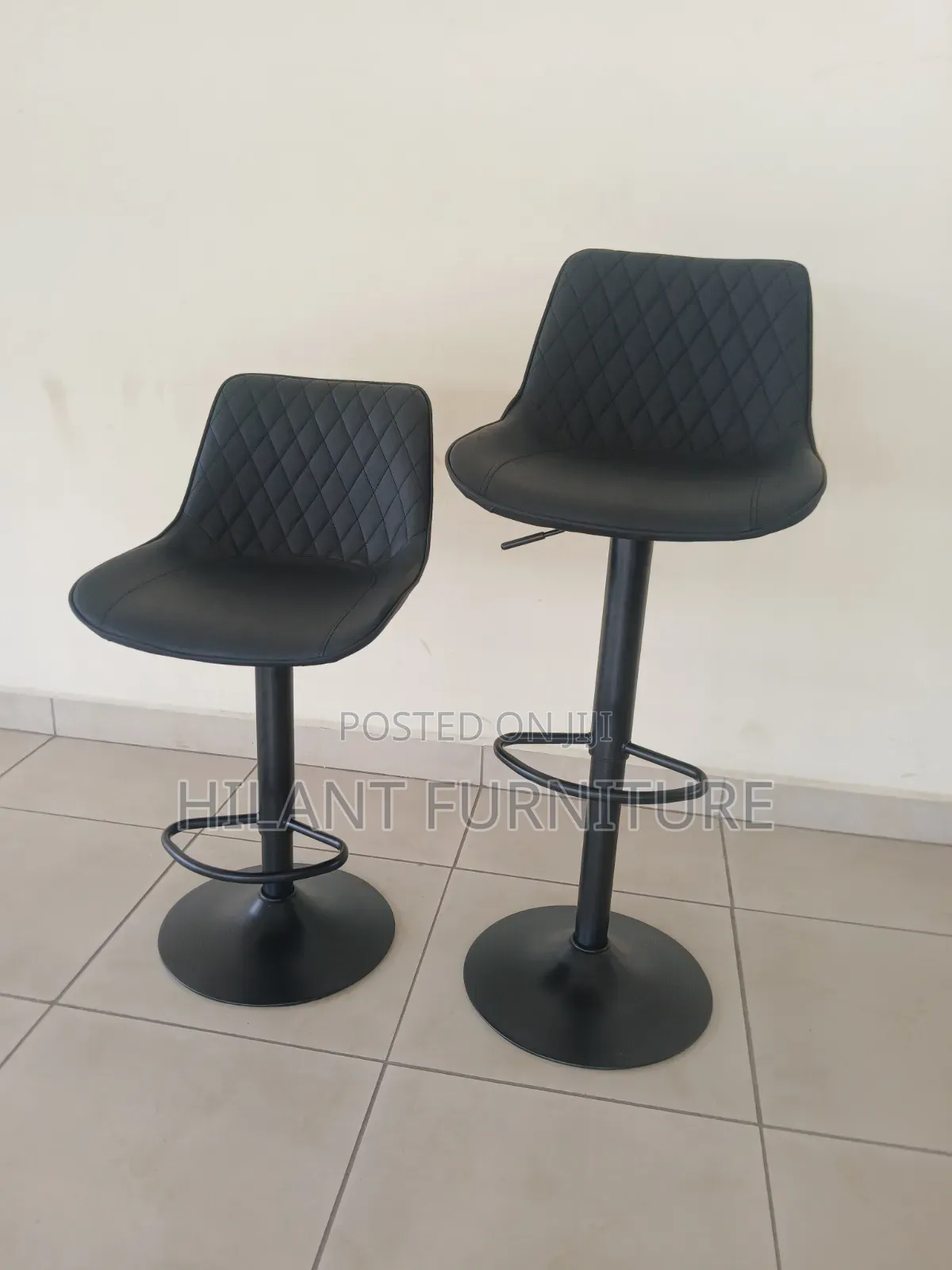 Black Adjustable Bar Stool.