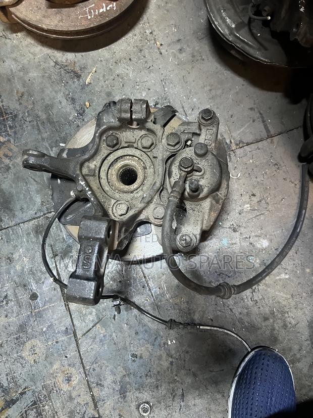 Tiida Calliper/Hub/Disc