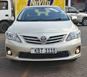 Toyota Corolla L 4dr Sedan (1.8L 4cyl 5M) 2012 Beige