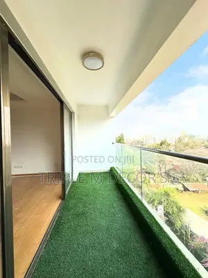 Revamp Apartment Balcony With Grass Carpet