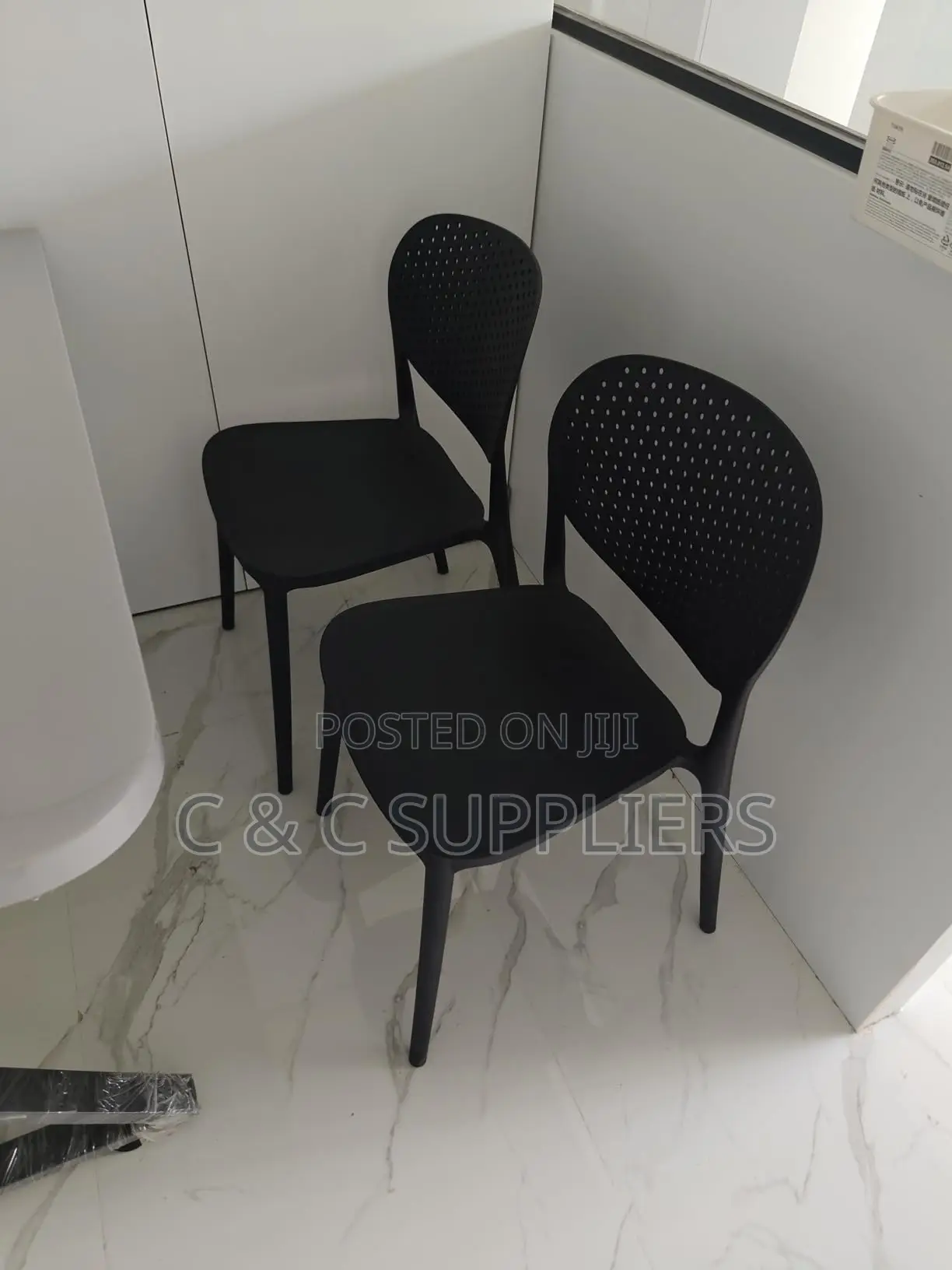 Black Plastic Armless Dining Chair.
