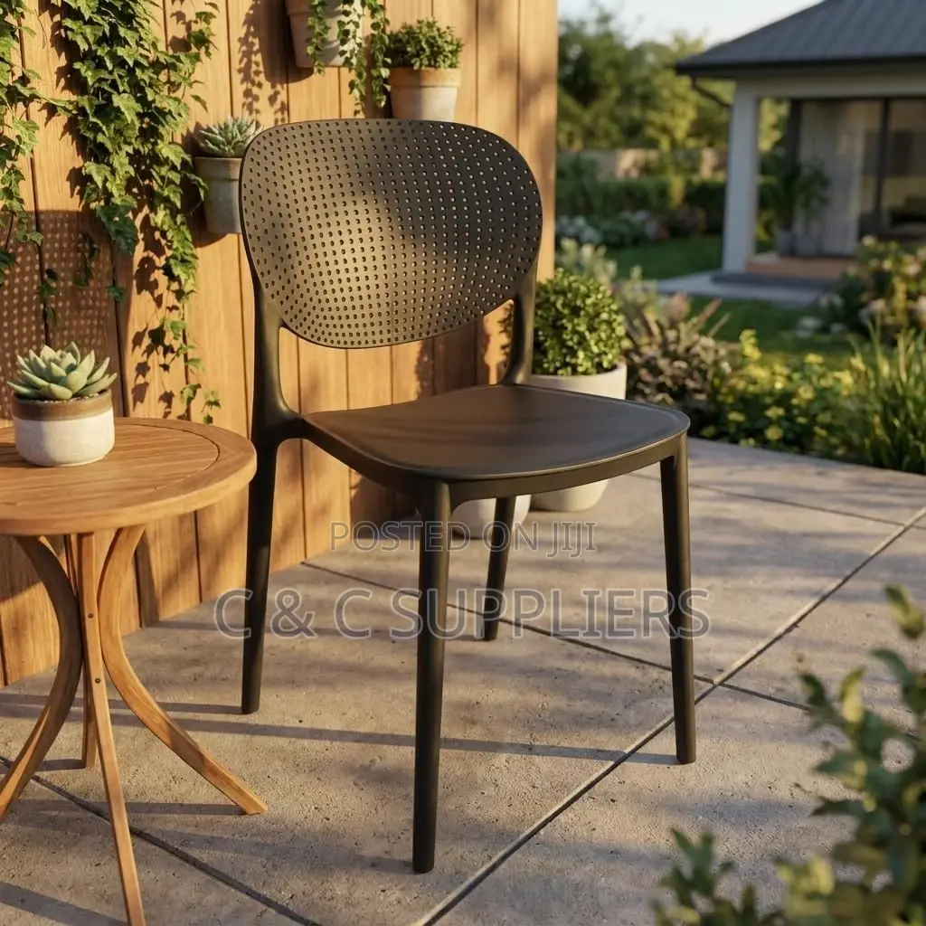 Black Plastic Armless Dining Chair.