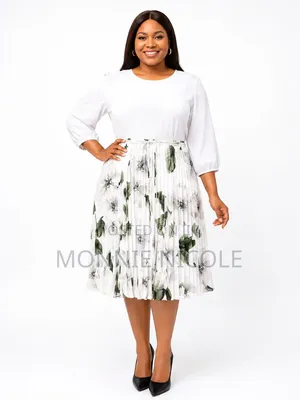 Floral Round Neck Tie Belt. Pleated Dress
