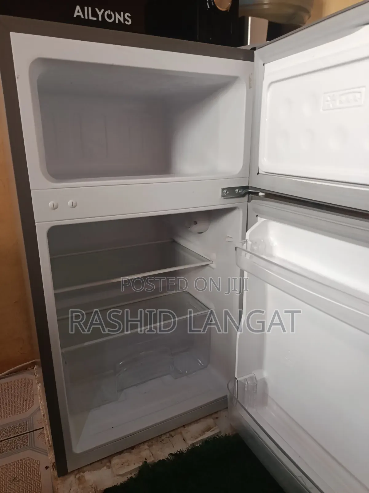 It Is a 86 Litre Roch Fridge With Freezer Double Door