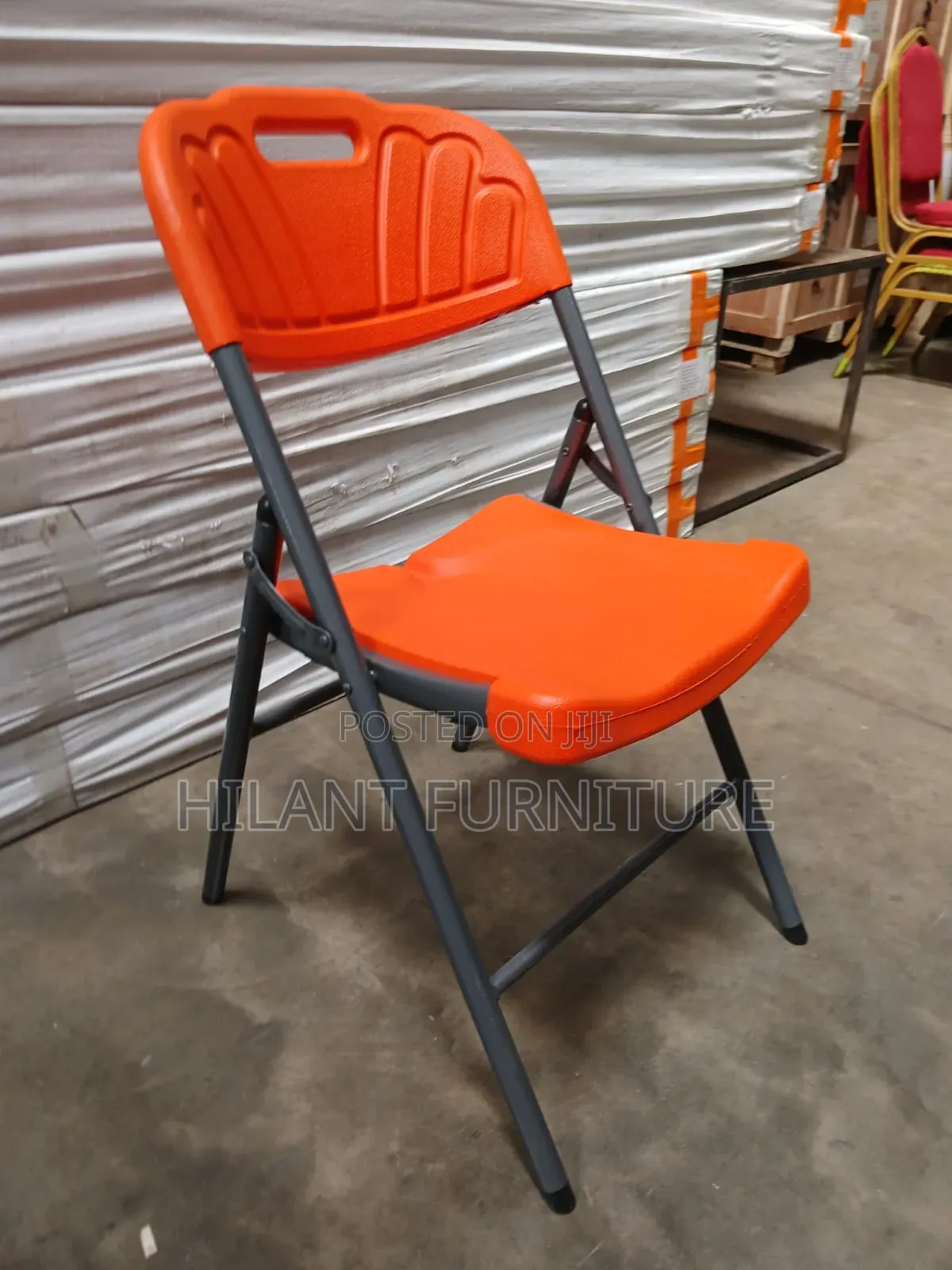 Heavy-Duty Orange Plastic Folding Chair