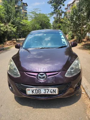 Mazda Demio 2013 Brown