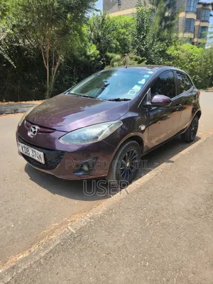 Mazda Demio 2013 Brown