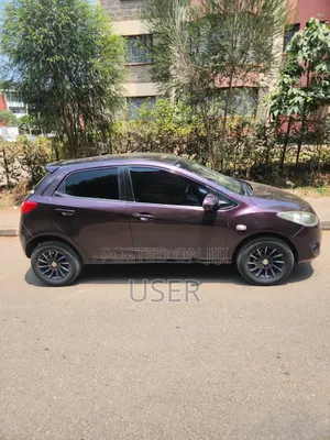Mazda Demio 2013 Brown