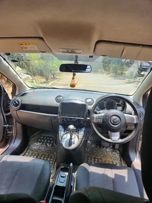 Mazda Demio 2013 Brown