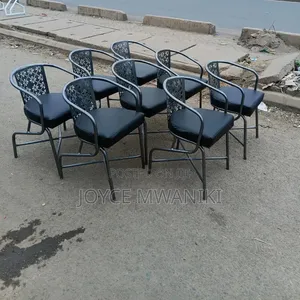 Silver Coated Restaurant Chairs With Black Padded Cushion